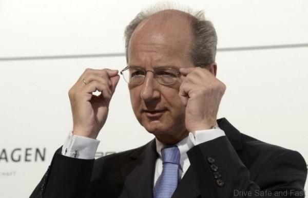 Hans Dieter Poetsch, CFO of German carmaker Volkswagen, adjusts his glasses during a news conference in Wolfsburg, July 5, 2012. REUTERS/Fabian Bimmer