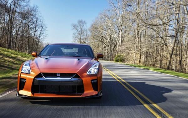 The 2017 GT-R's exterior receives a thorough makeover. The new "V-motion" grille, one of Nissan's latest design signatures, has been slightly enlarged to provide better engine cooling and now features a matte chrome finish and an updated mesh pattern. A new hood, featuring pronounced character lines flowing flawlessly from the grille, has been reinforced to enhance stability during high-speed driving. A freshly designed front spoiler lip and front bumpers with finishers situated immediately below the headlamps give the new GT-R the look of a pure-bred racecar, while generating high levels of front downforce.