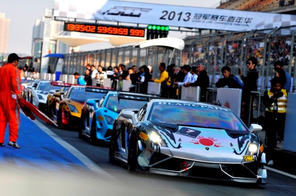 Teams Line up in the Pit Lane Just Before the Race