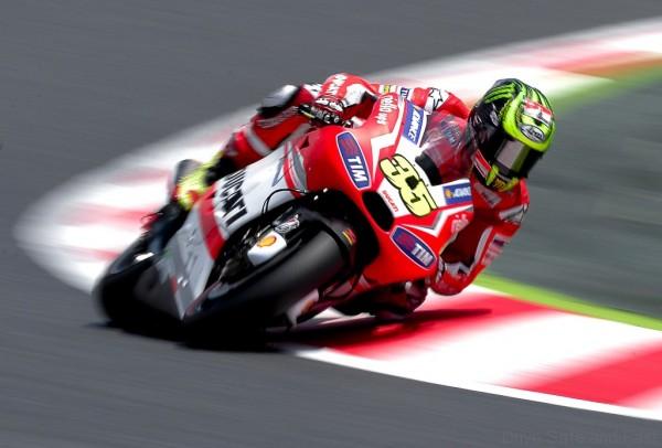 Monster Yamaha Tech 3 motoGP's British rider Cal Crutchlow takes part in the second Moto GP free practice of the Catalunya Grand Prix at the Montmelo racetrack, near Barcelona, on June 13, 2014.  AFP PHOTO / JOSEP LAGO        (Photo credit should read JOSEP LAGO/AFP/Getty Images)