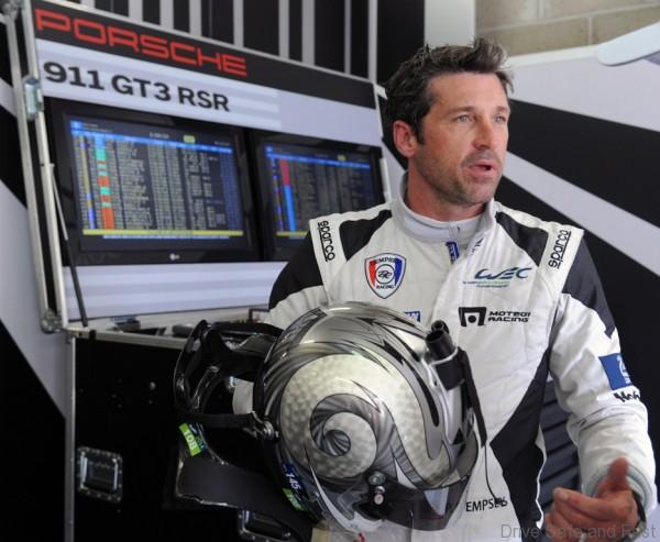 US Actor Patrick Dempsey, who drives the Porsche 911 RSR N° 77, looks on as he rests in his pit during the test day of the 82th Le Mans 24 hours endurance race, on June 1, 2014, in Le Mans, western France. Fifty-six cars with 168 drivers will participate on June 14 and 15 in the Le Mans 24-hours endurance race. AFP PHOTO / JEAN FRANCOIS MONIER        (Photo credit should read JEAN-FRANCOIS MONIER/AFP/Getty Images)