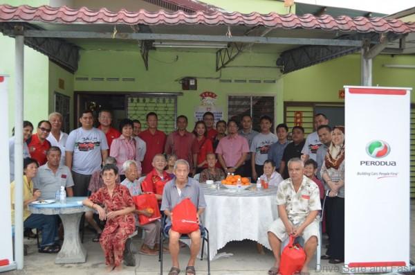 Perodua group photo charity