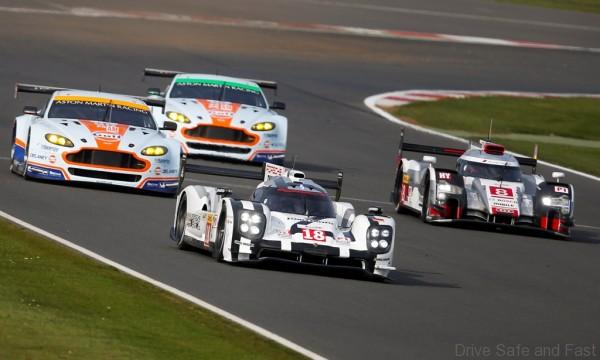 18 DUMAS Romain (FRA) JANI Neel (CHE) LIEB Marc (GER) PORSCHE 919 hybrid team Porsche, 08 DUVAL Loic (FRA) DI GRASSI Lucas (BRA) JARVIS Oliver (GBR) AUDI R18 ETron Quattro team Audi Sport Joest action during the 2015 FIA WEC World Endurance Championship 6 Hours of Silverstone, England, from April 9th to 12th 2015. Photo DPPI / Jean Michel Le Meur.