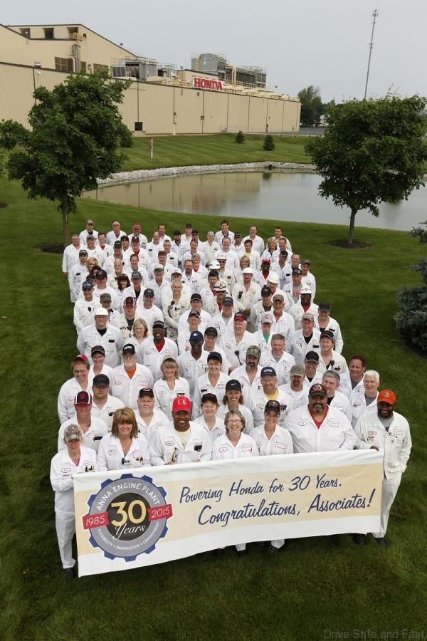 Members of the Anna team pause for a celebration photo in front of the engine plant.