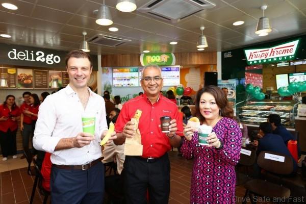 Image 2 - (L to R) - Nick Tiernan Datuk Azman Ismail and Ms  Yau Su Peng with some of the food  beverage offerings available at the new Shell Select Store
