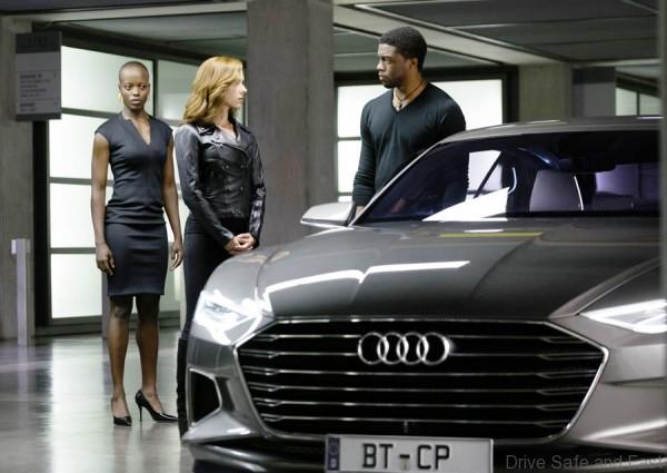 From right: Black Panther/ T’Challa (Chadwick Boseman), Black Widow (Scarlet Johansson) and security chief (Florence Kasumba).