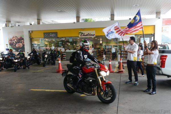 Shell Advance Brand Manager Desiree Cheng (R) and Digital Marketing Manager Ian Chook flagging off the #Advance2Langkawi riders
