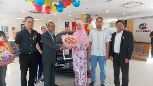 Teacher is the proud owner of the 250,000th Perodua Axia