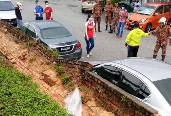 Cars Damaged As Retaining Wall Collapses In Ipoh