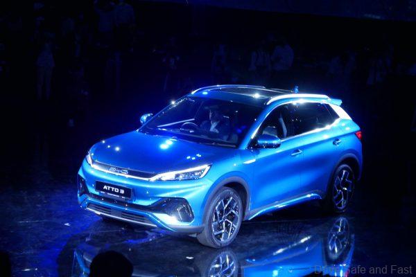 front of the BYD Atto 3 in Surf Blue