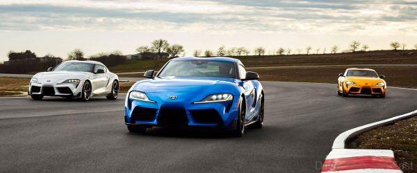 Toyota GR Supra in three colours on track