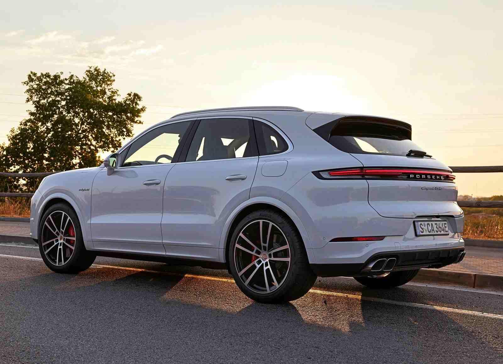 Porsche Cayenne Turbo E-Hybrid in motion, shot taken from rear third quarter